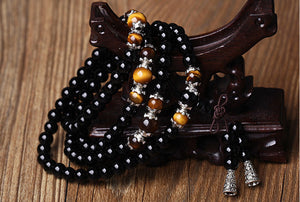 Tibetan mala with 108 stone beads, onyx, tiger's eye or red agate